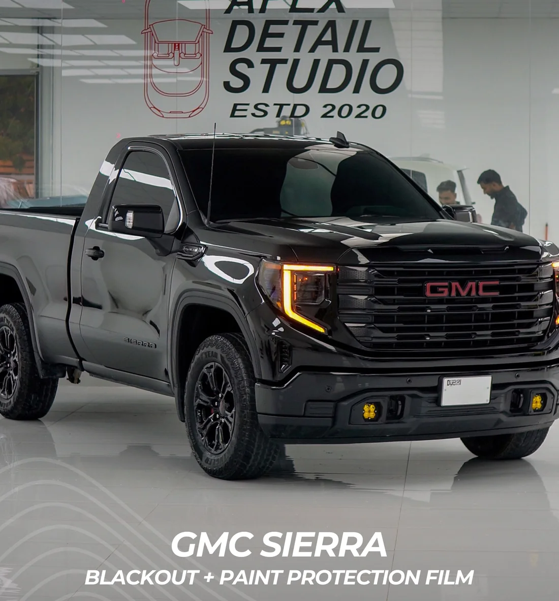 GMC Sierra blackout and paint protection film XPEL PPF installation detail at Apex Detail Studio