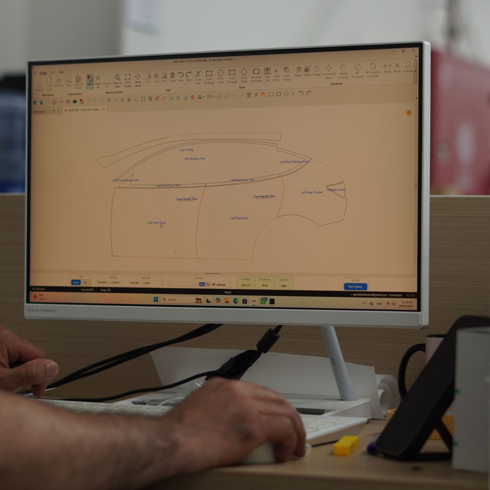 PPF plotter software screen showing a vehicle-specific film pattern being prepared at Apex Detail Studio Dubai