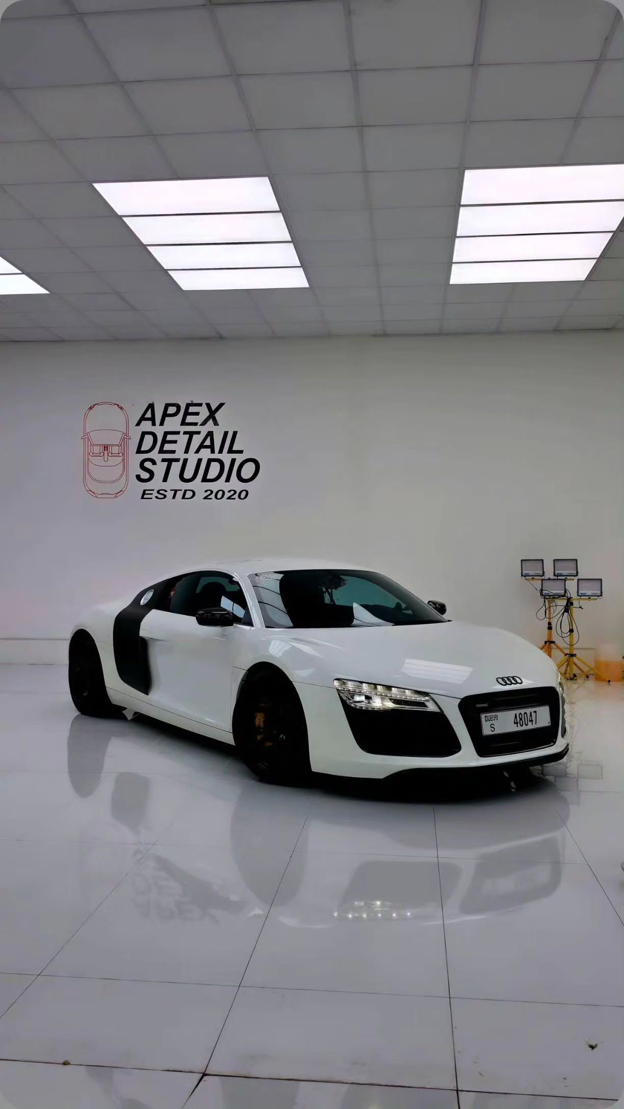 White Audi R8 with a glossy finish in the Apex Detail Studio Dubai showroom