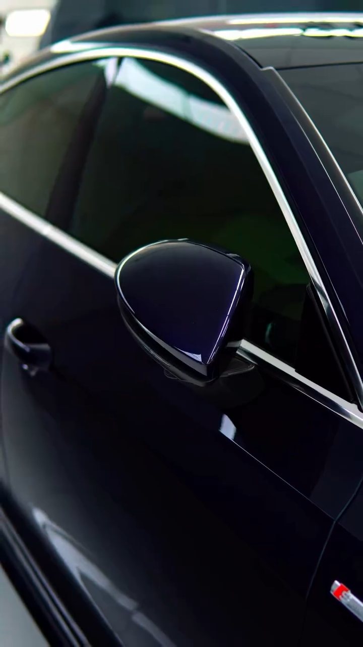 Gloss on the Audi A7 door and mirror after ceramic coating in Dubai