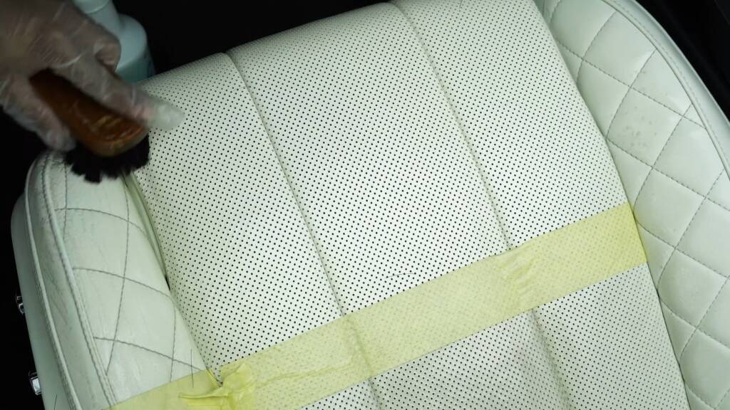 Horsehair brush cleaning perforated Bentley leather