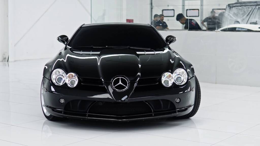 Front view of a finished black Mercedes-Benz SLR McLaren at Apex Detail Studio Dubai