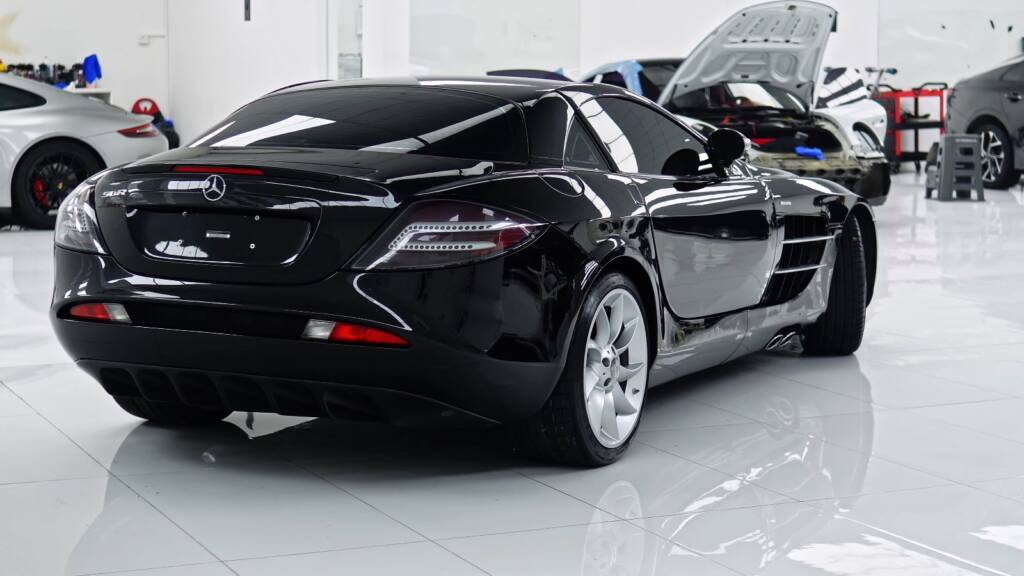 Rear three quarter view of a black Mercedes-Benz SLR McLaren finished with full body PPF at Apex Detail Studio Dubai