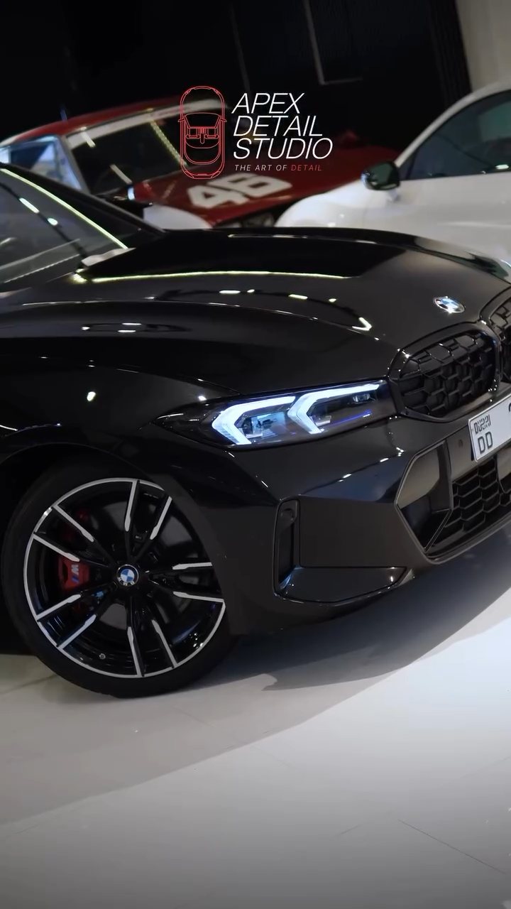 Coated black BMW front three-quarter and wheel in Dubai