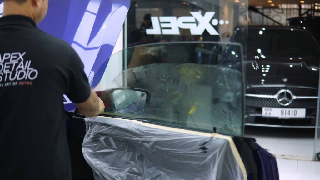 Window tint being fitted to a BMW M2 CS at Apex Dubai