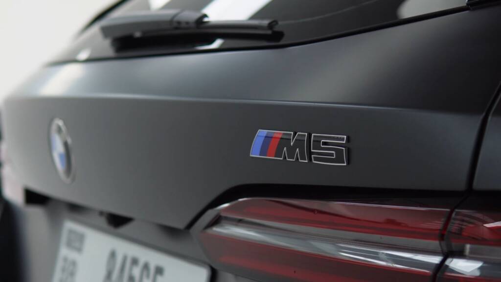 Matte grey BMW M5 Touring tailgate and M5 badge after matte PPF