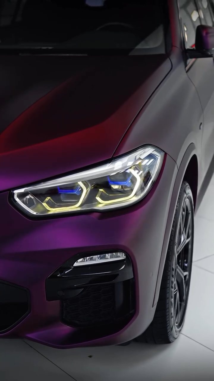 BMW X5 headlight and front wing in purple colour PPF, Dubai