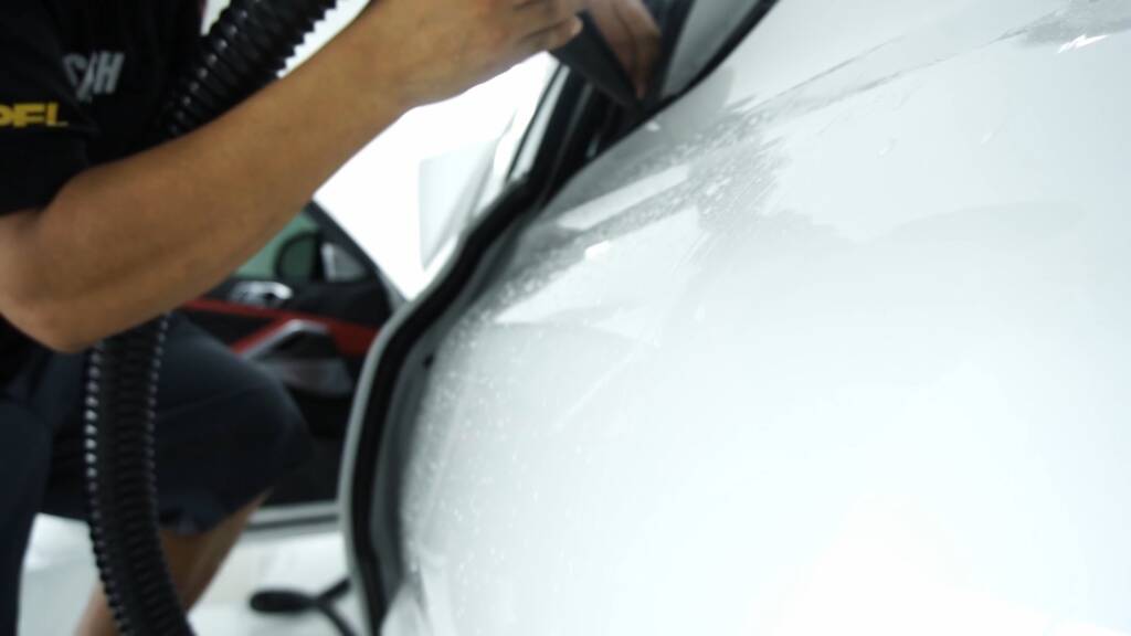 2024 BMW X6 M Competition rear arch film shaped with heat at Apex Detail Studio Dubai