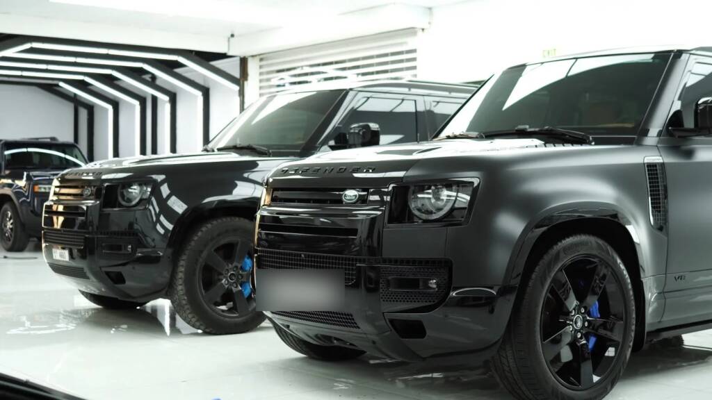 Blue brake calipers on a Land Rover Defender 110 Carpathian conversion