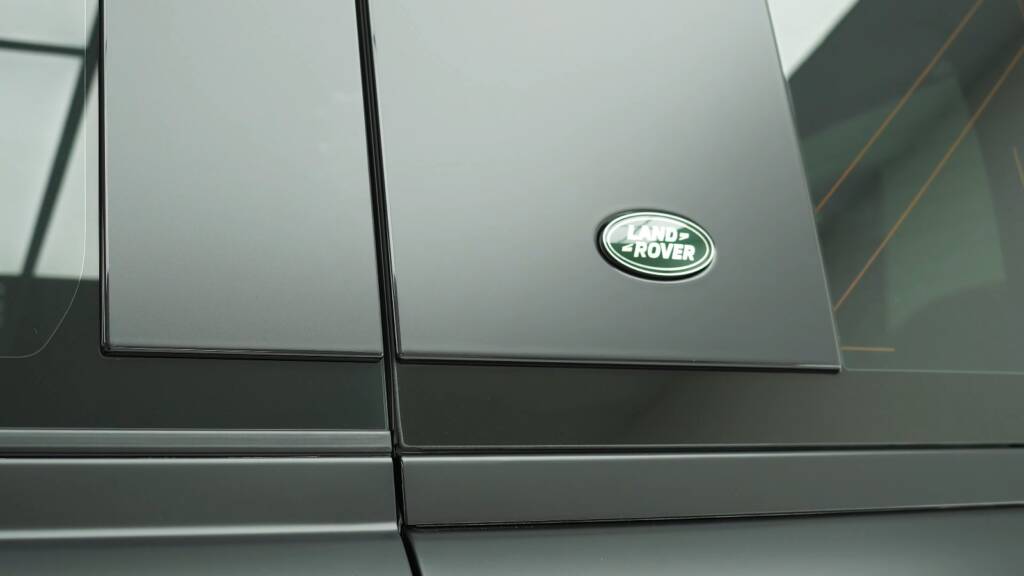Land Rover badge on a satin Land Rover Defender 110 Carpathian conversion