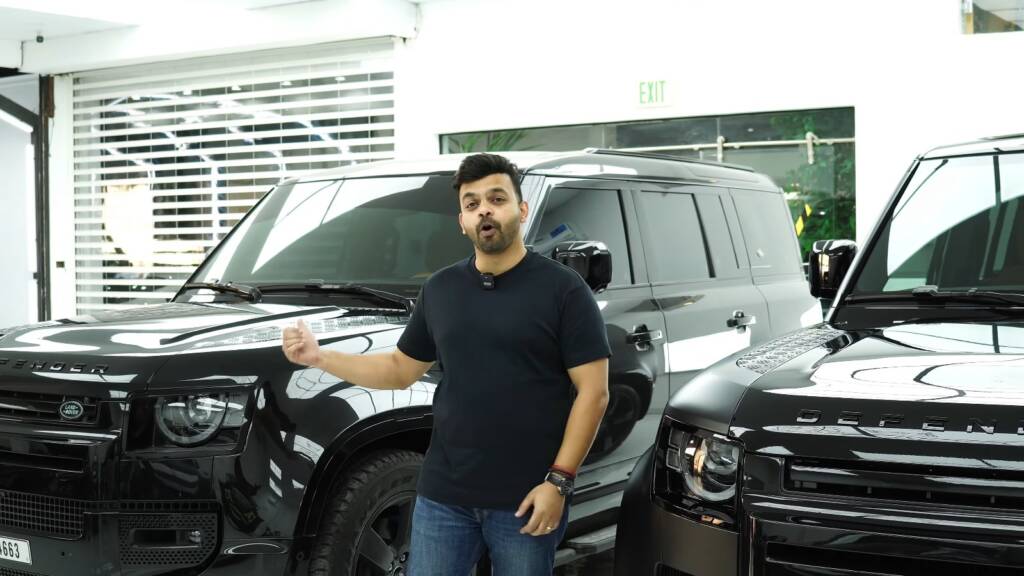 Side by side view of a satin Land Rover Defender 110 at Apex Detail Studio
