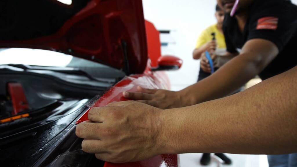 Tucking PPF under a Ferrari Portofino bonnet edge