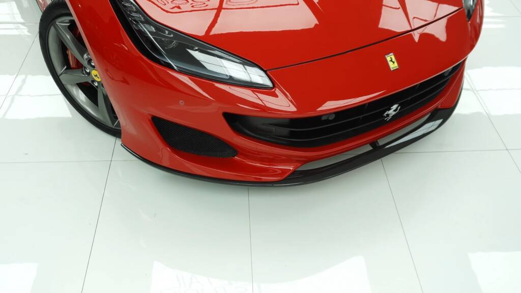 Red Ferrari Portofino front after PPF replacement