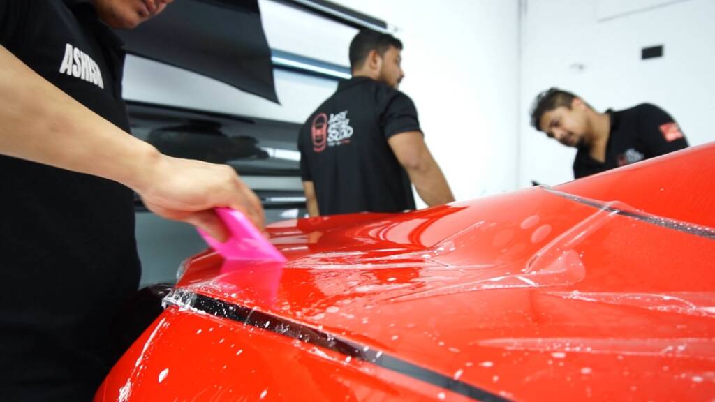 Squeegee on new PPF on a Ferrari Portofino