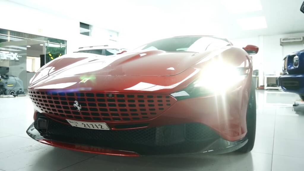 Red Ferrari Roma Spider at Apex Detail Studio Dubai before premium PPF