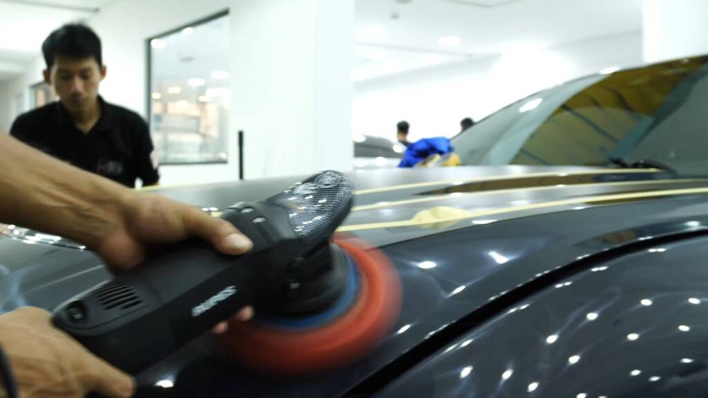 Machine polishing the 2024 Ford Mustang Dark Horse paint before PPF at Apex Detail Studio Dubai