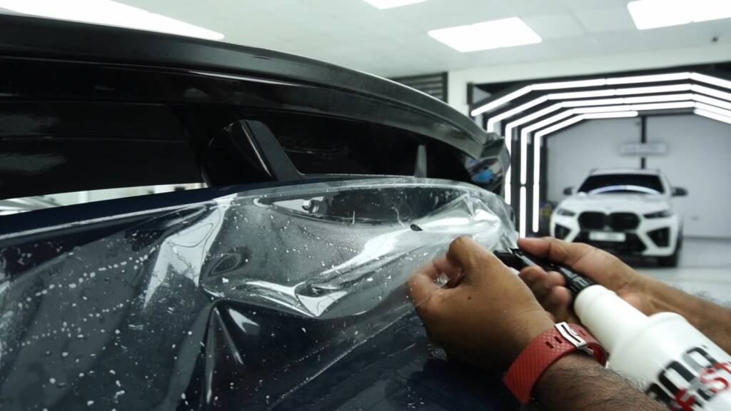 Fitting PPF on the rear of the 2024 Ford Mustang Dark Horse at Apex Detail Studio Dubai