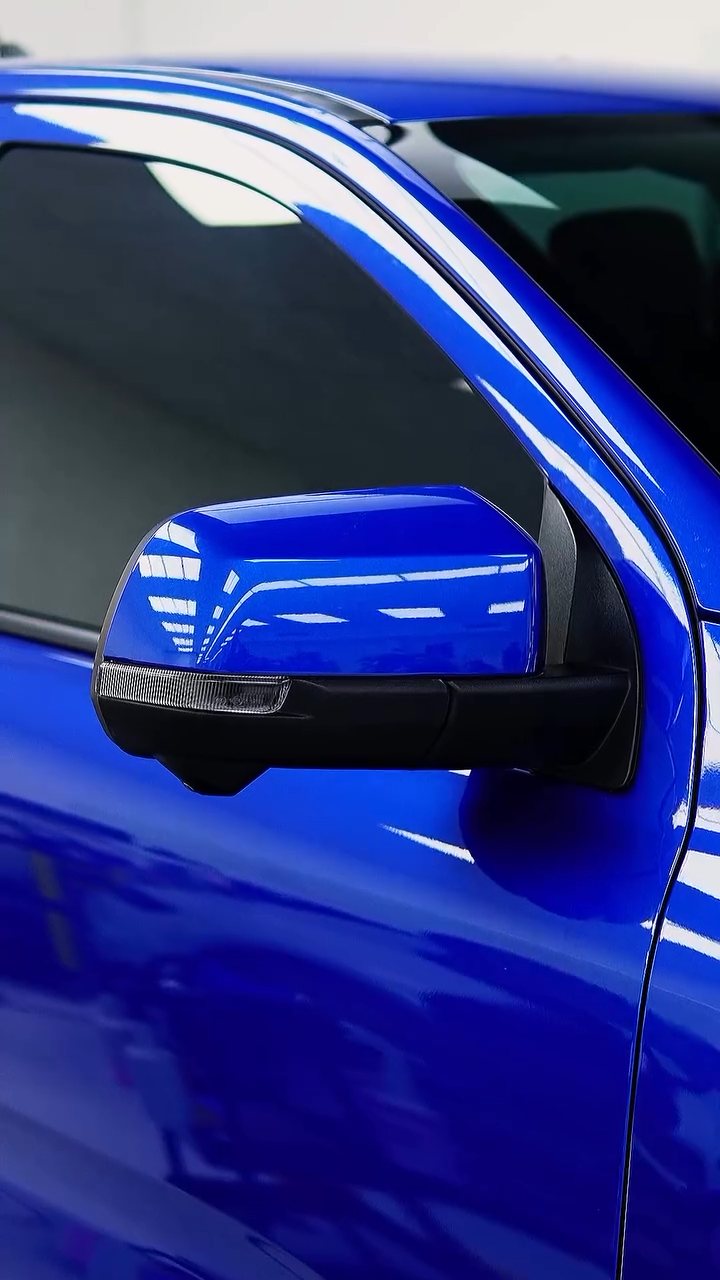 Blue Ford Raptor mirror and door with matte PPF at Apex Detail Studio Dubai