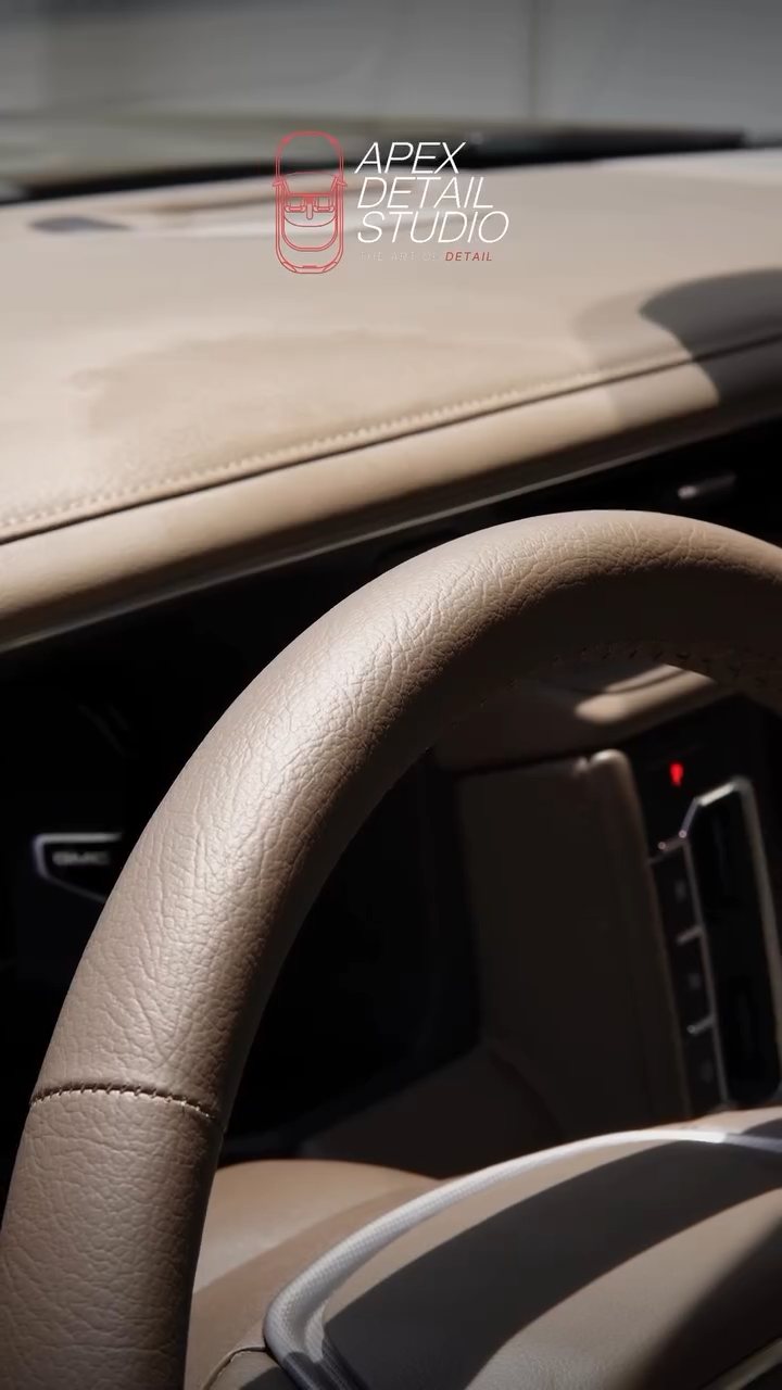 Dusty GMC Denali dashboard top before cleaning in Dubai