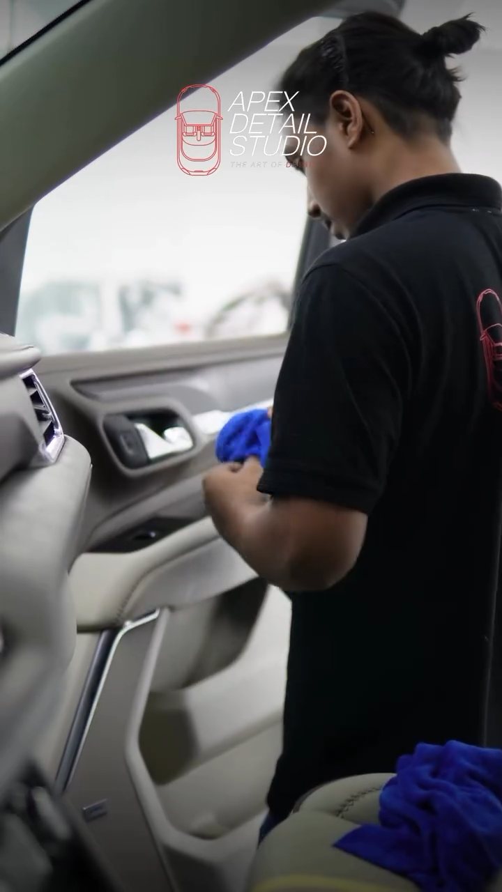 Apex detailer working inside the GMC Denali cabin in Dubai