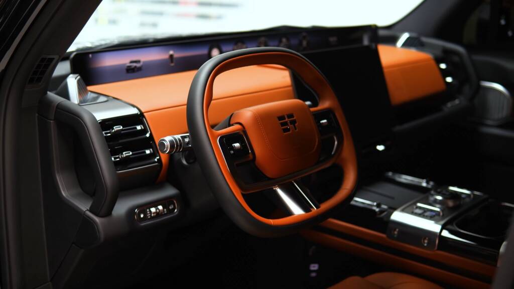 Jetour G700 interior with orange leather and screens protected at Apex Dubai