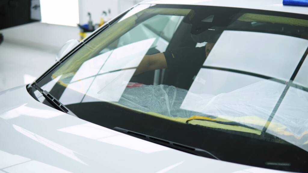 Window film being fitted to the windscreen area of a Lamborghini Urus SE