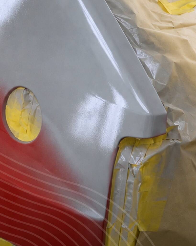 Fuel flap area of the Lancia Delta Integrale showing red paint turning Nardo Grey at Apex Detail Studio Dubai