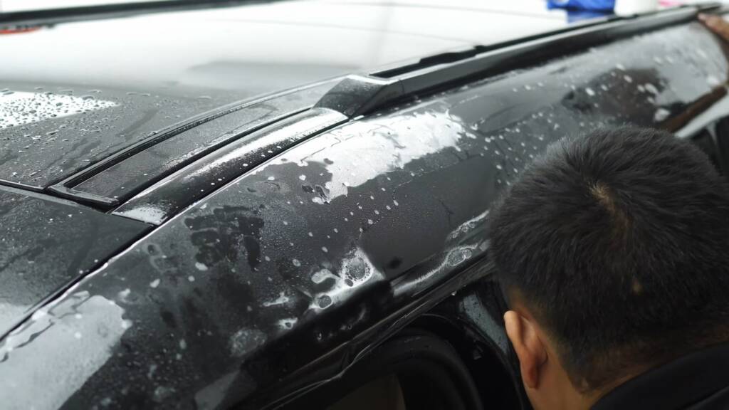 Squeegee on PPF on a Defender 130 bonnet