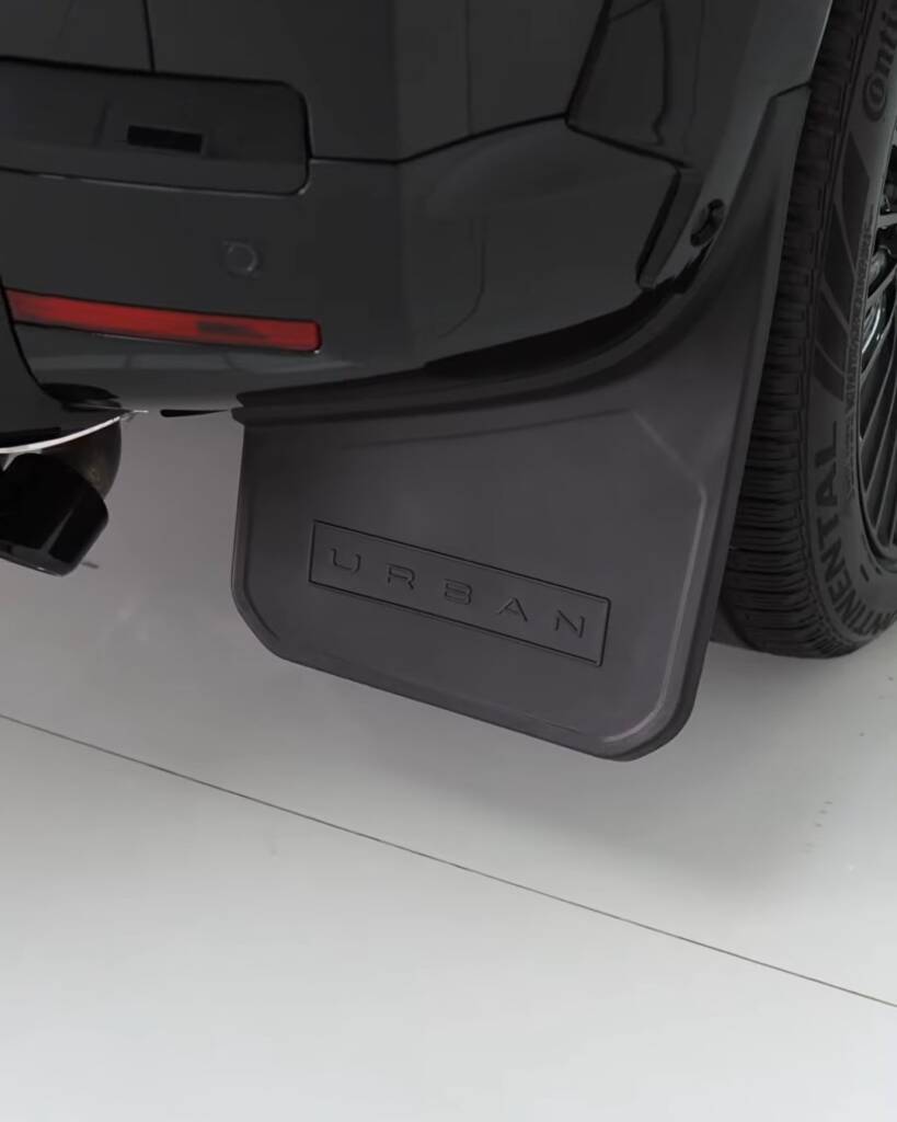 Rear mud flap and arch on a 2026 Defender body kit at Apex Detail Studio