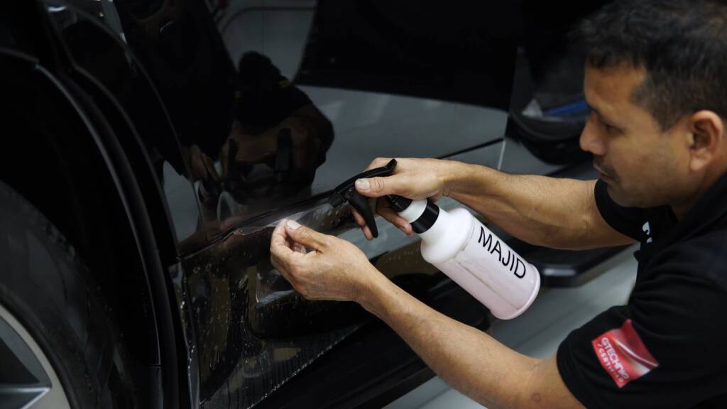 Edge wrapping PPF on a 2026 Land Rover Defender at Apex Detail Studio