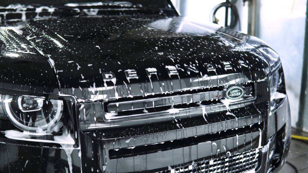 Front grille of a new Land Rover Defender cleaned before PPF at Apex Dubai