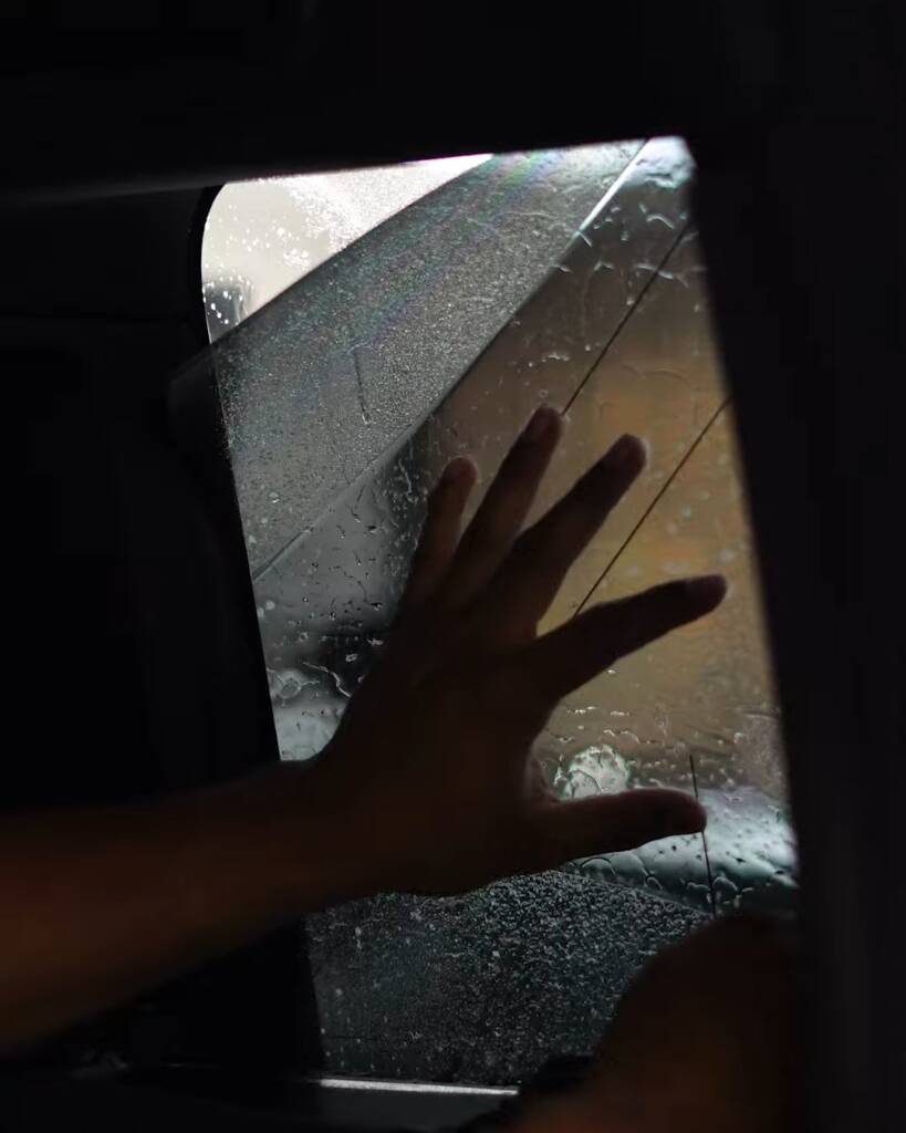 Window tint film applied to wet glass on a 2026 Land Rover Defender, Dubai