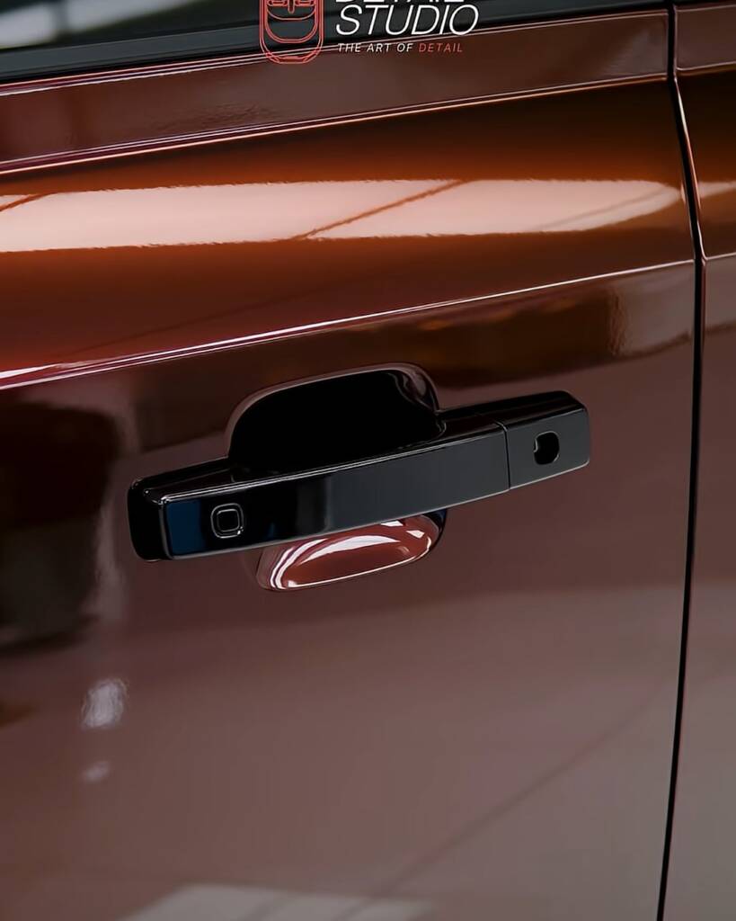 Land Rover Defender door handle area in Sedona Red colour PPF at Apex Dubai