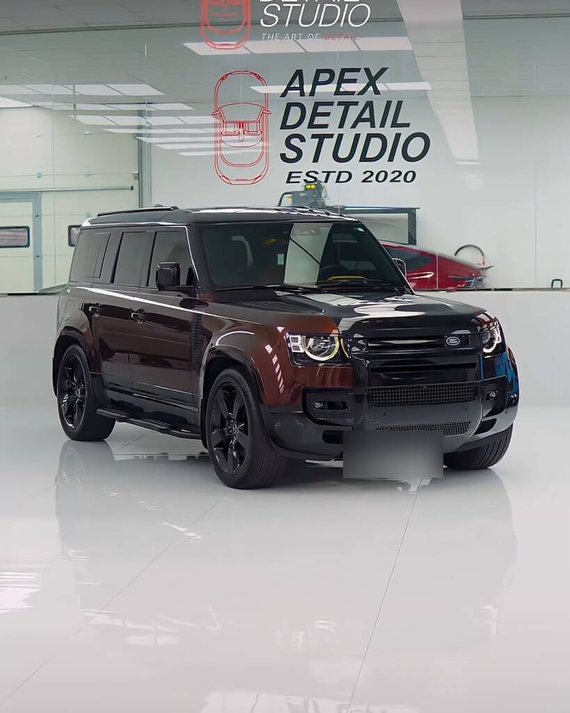 The same Land Rover Defender after Sedona Red colour PPF, Apex Detail Studio Dubai
