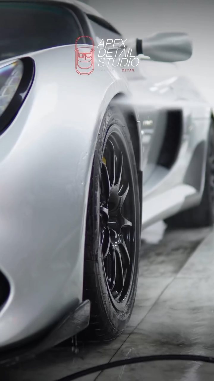 Silver Lotus Exige 410 Sport wheel and arch being rinsed at Apex Detail Studio Dubai