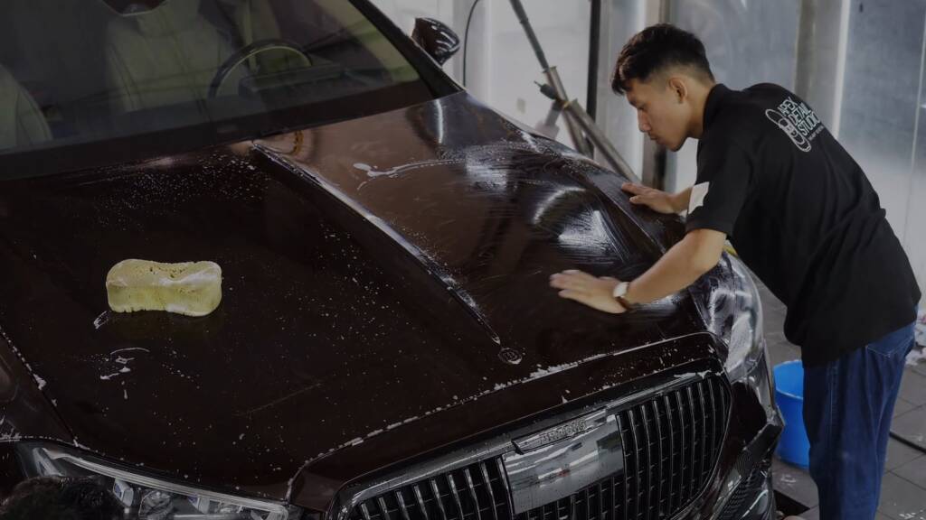 Washing the bonnet of a Maybach S680 Brabus