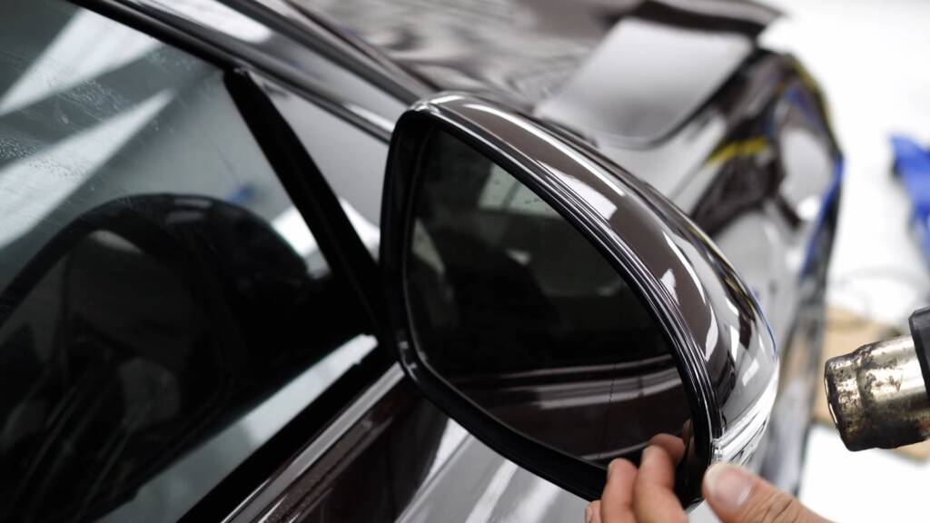 Heat gun on PPF on a Maybach S680 Brabus mirror