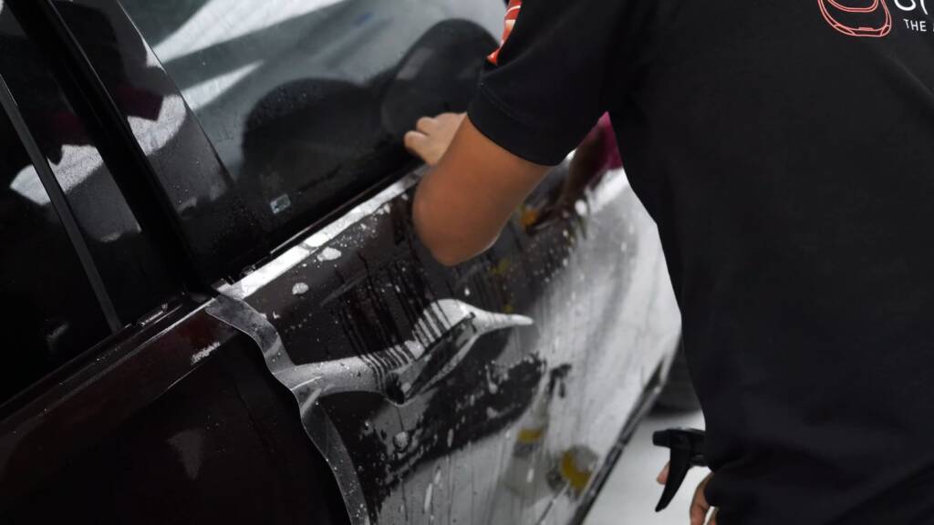 Squeegee on PPF on a Maybach S680 rear door