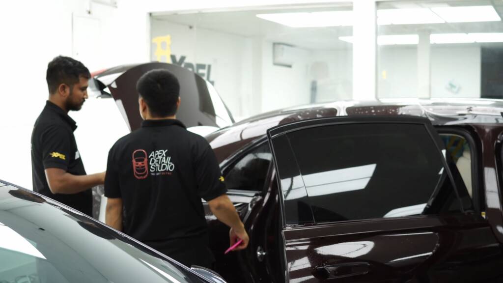 Installers working on a Maybach S680 Brabus