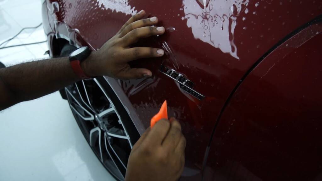 Trimming PPF at a Mercedes-AMG CLA door edge