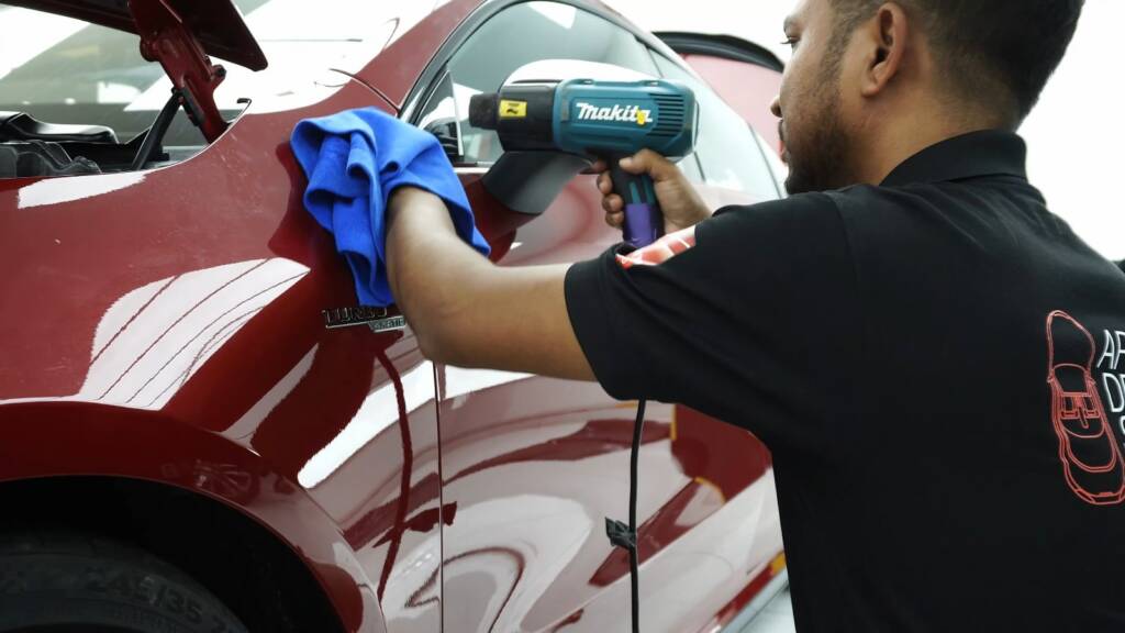 Heat gun setting PPF on a Mercedes-AMG CLA front wing