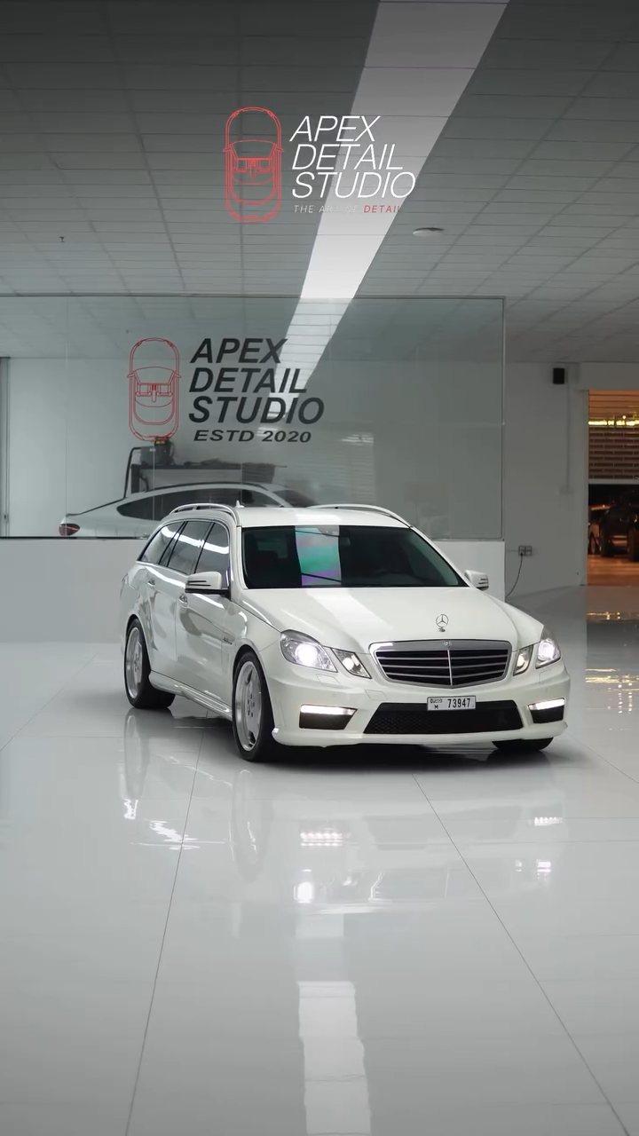 White Mercedes-AMG E63 estate finished in the Apex Detail Studio showroom, Dubai