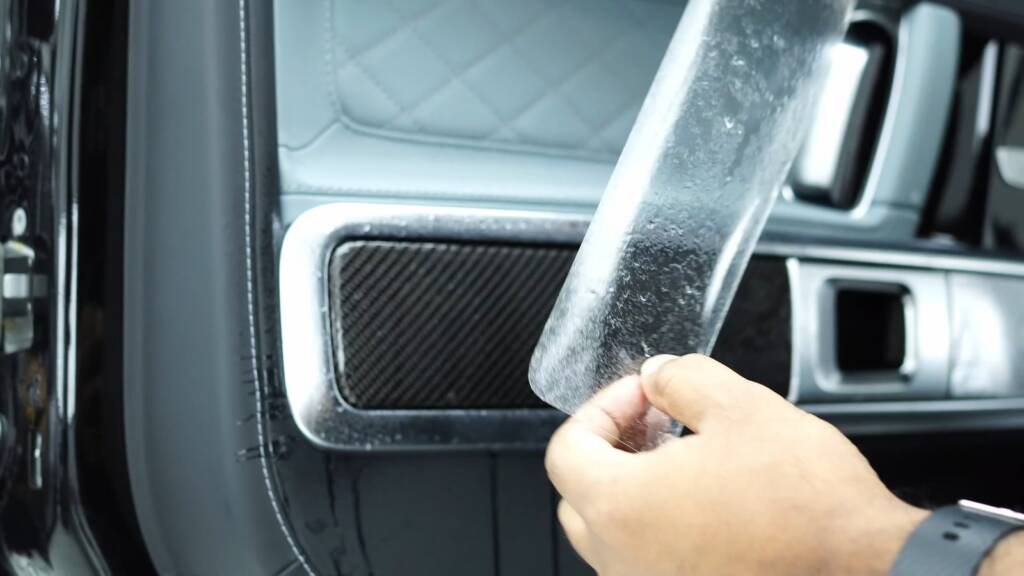 Applying film to Mercedes-AMG G63 carbon interior trim