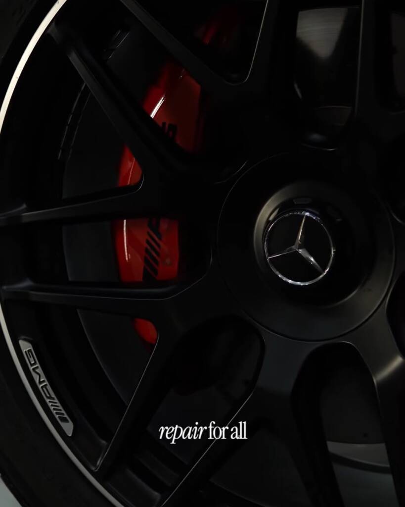Repainted red calipers behind repaired black rims on a Mercedes-AMG G63, Dubai