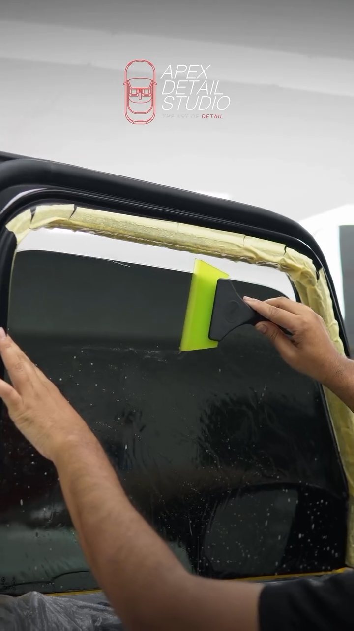 Window tint top edge being set on the Mercedes-AMG G63 in Dubai