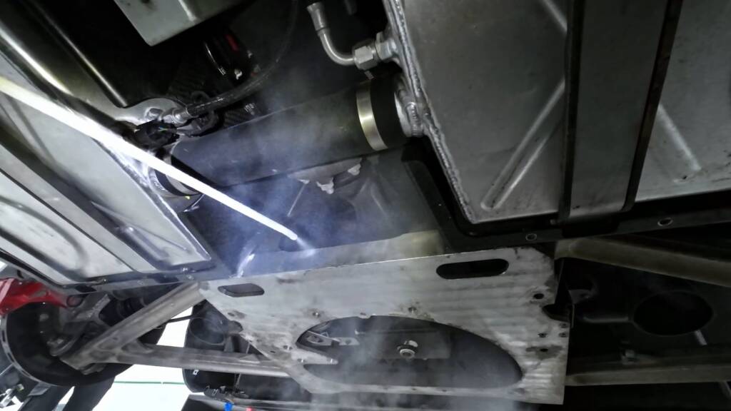 Dry ice cleaning the underbody panels of a Mercedes-Benz SLR McLaren at Apex Detail Studio Dubai