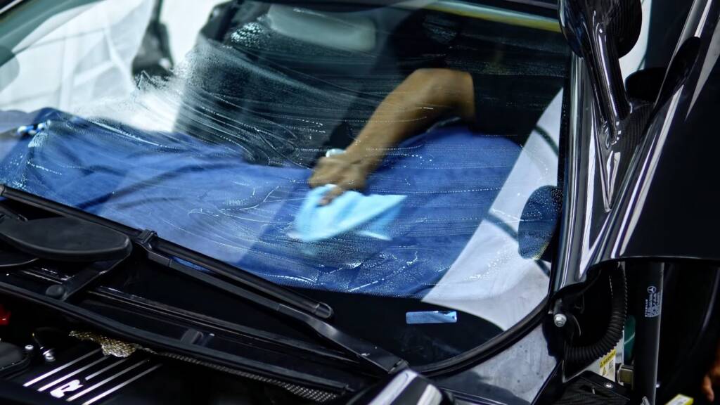 Window tint being fitted to a Mercedes-Benz SLR McLaren at Apex Detail Studio in Al Quoz Dubai