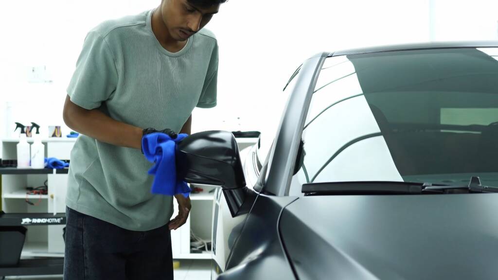 Final wipe of a matte Nissan GTR after PPF