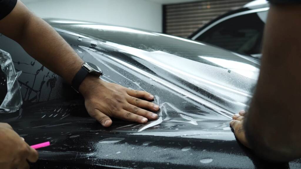 Laying satin PPF on a Nissan GTR bonnet