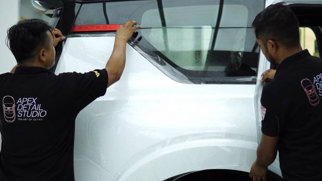 PPF on the rear door of a white Nissan Patrol Nismo